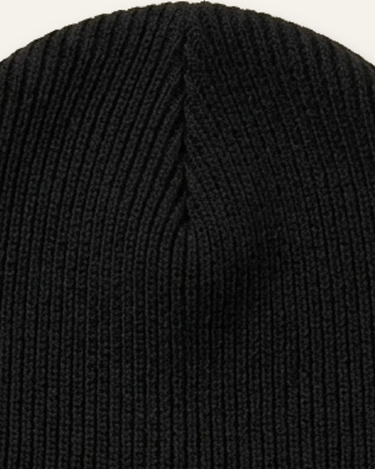 Cuffed Beanie in Black, laid flat, detail