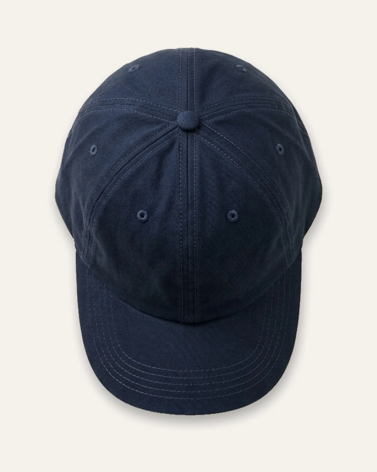 Unstructured Dad Cap in Navy, laid flat